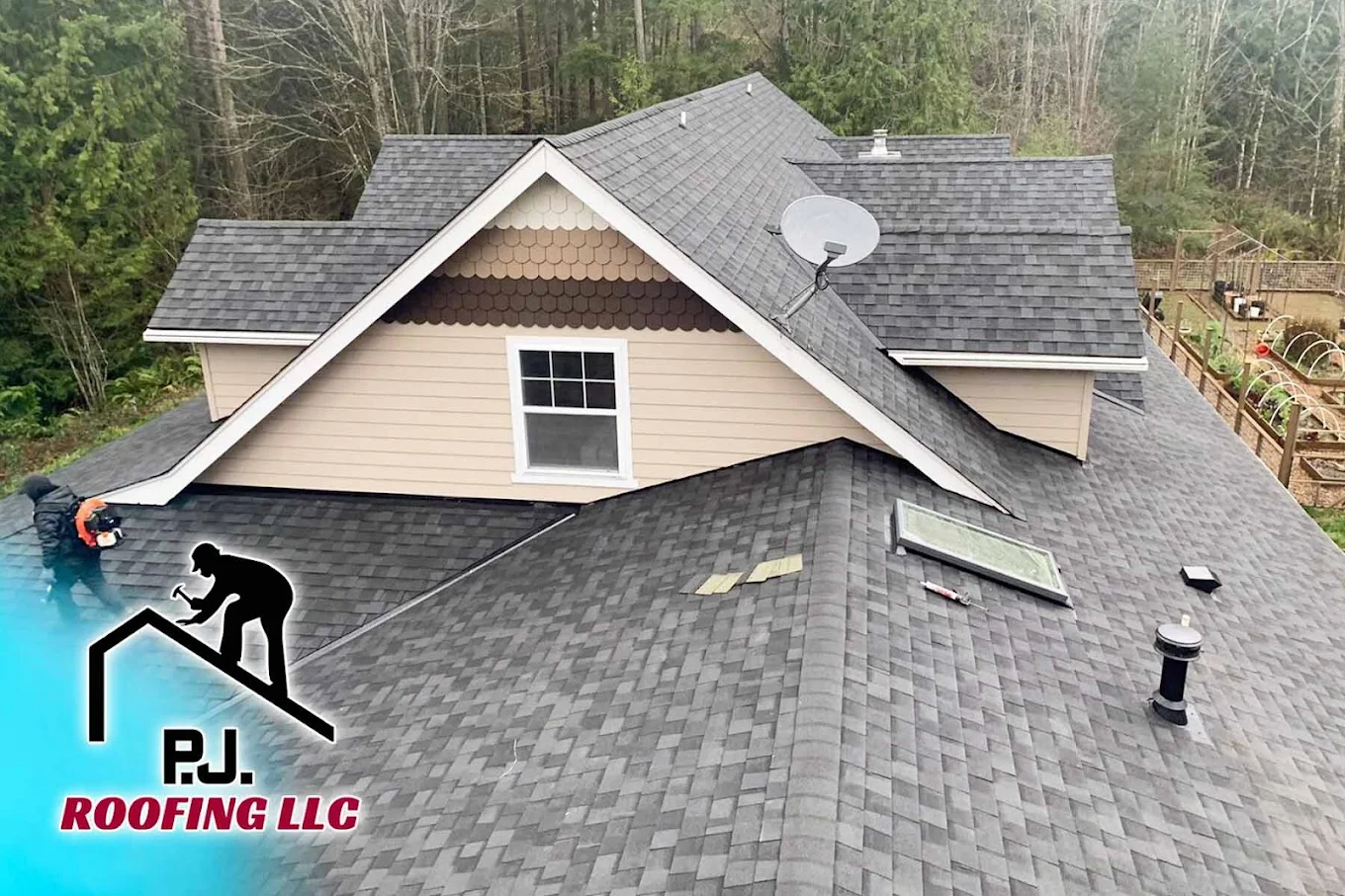 Aerial view of a completed roof with complex roofline