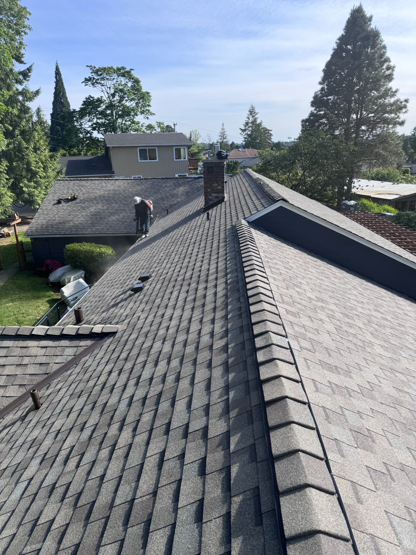 Completed architectural shingle roof by P.J Roofing LLC