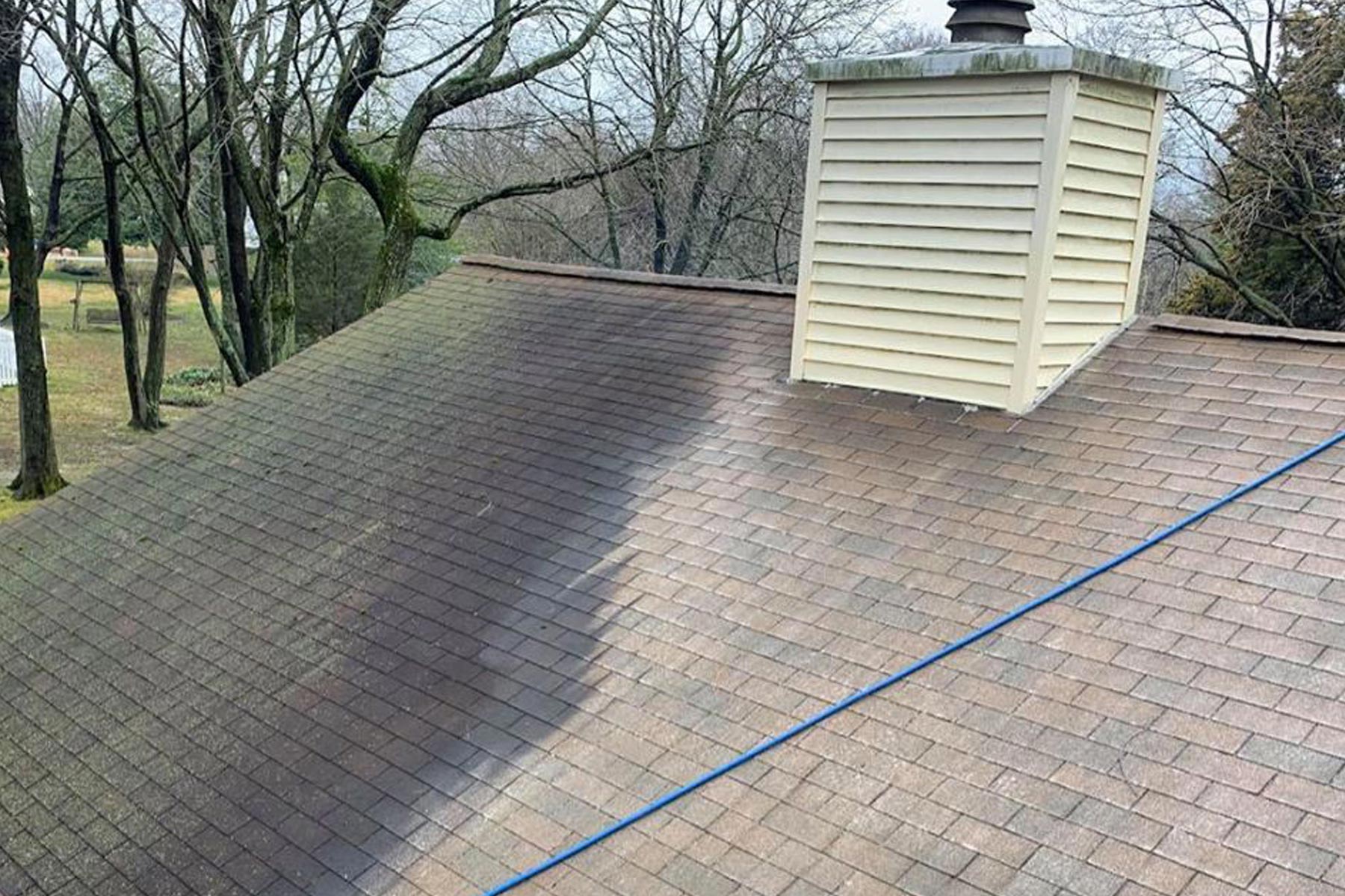 Pacific Northwest shingle roof being cleaned and prepared for wet fall and winter weather